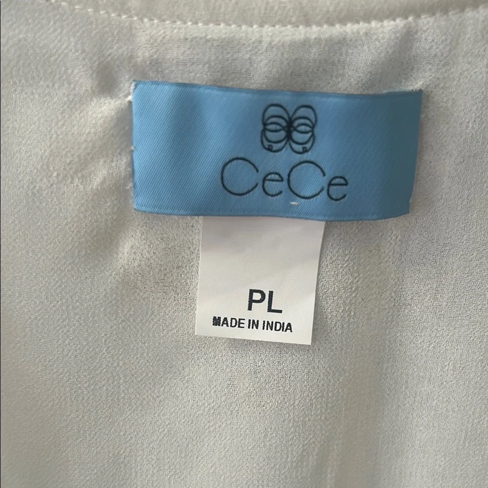 Smocked shoulders and cuffs on White 3/4 Sleeve Buttoned Blouse - Picture 2 of 4